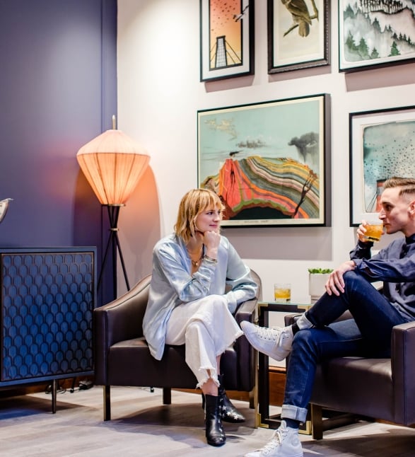 A couple having cocktails at the Heathman Hotel in Portland, Oregon.