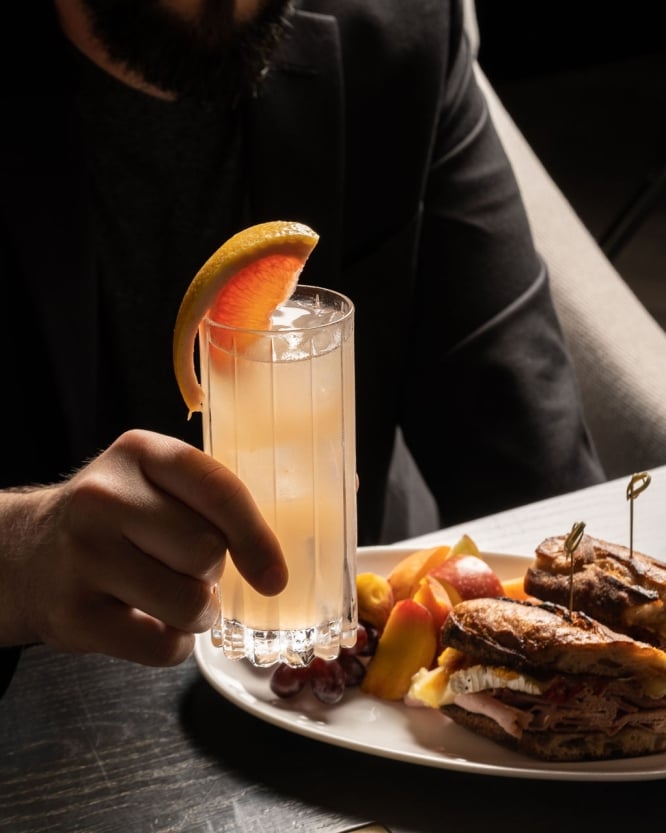 enjoying a cocktail at The Heathman's Tavern restaurant